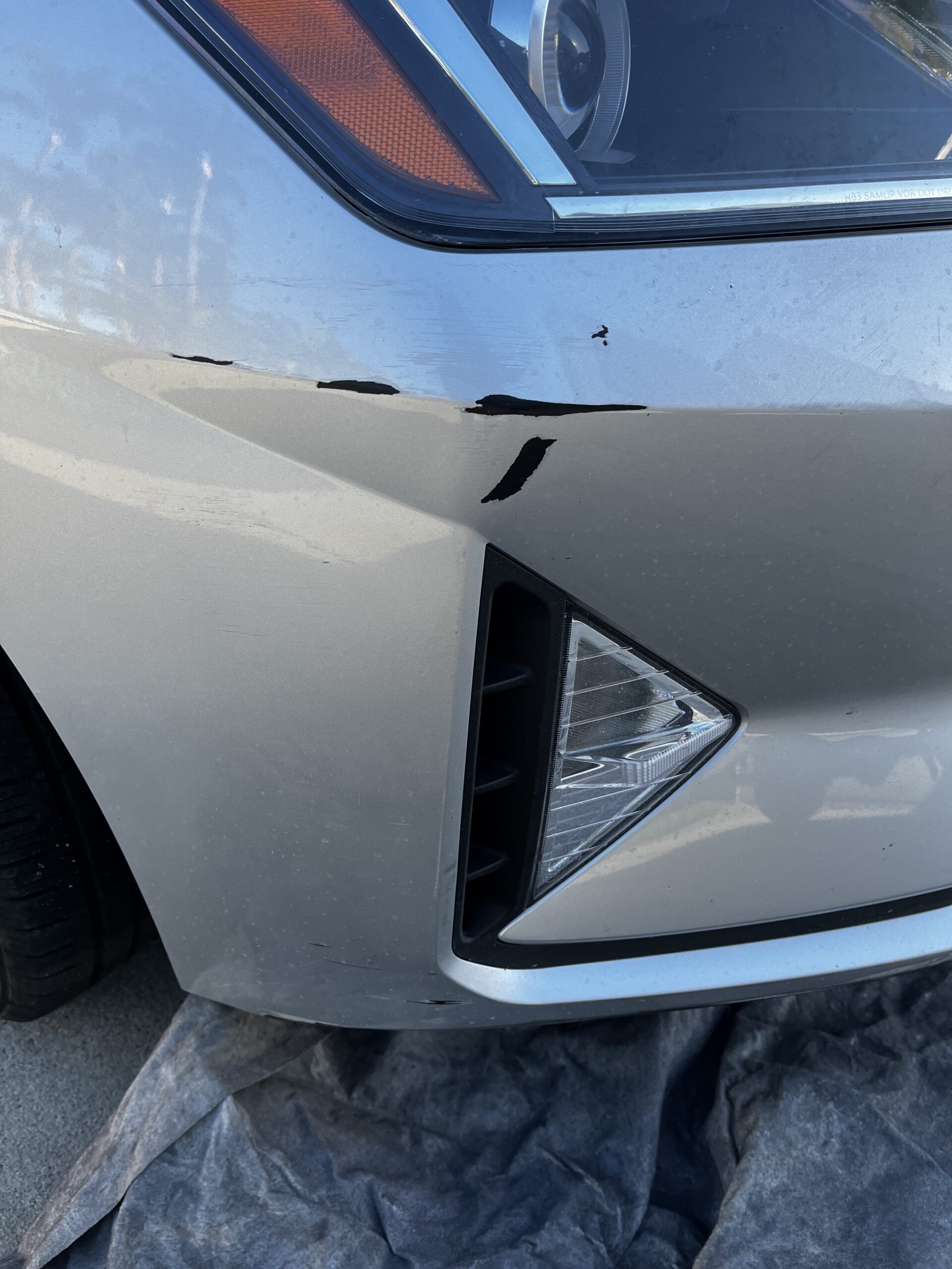 before and after photo of bumper repair